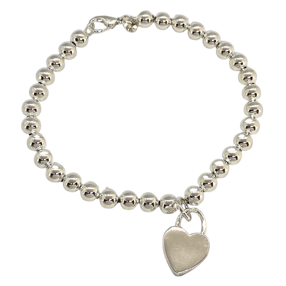 Silver Bracelet with Heart Pendant